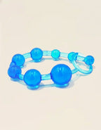 Perles anales Satin Touch bleues en anneau – Stimulation douce et progressive, Jardin Intime